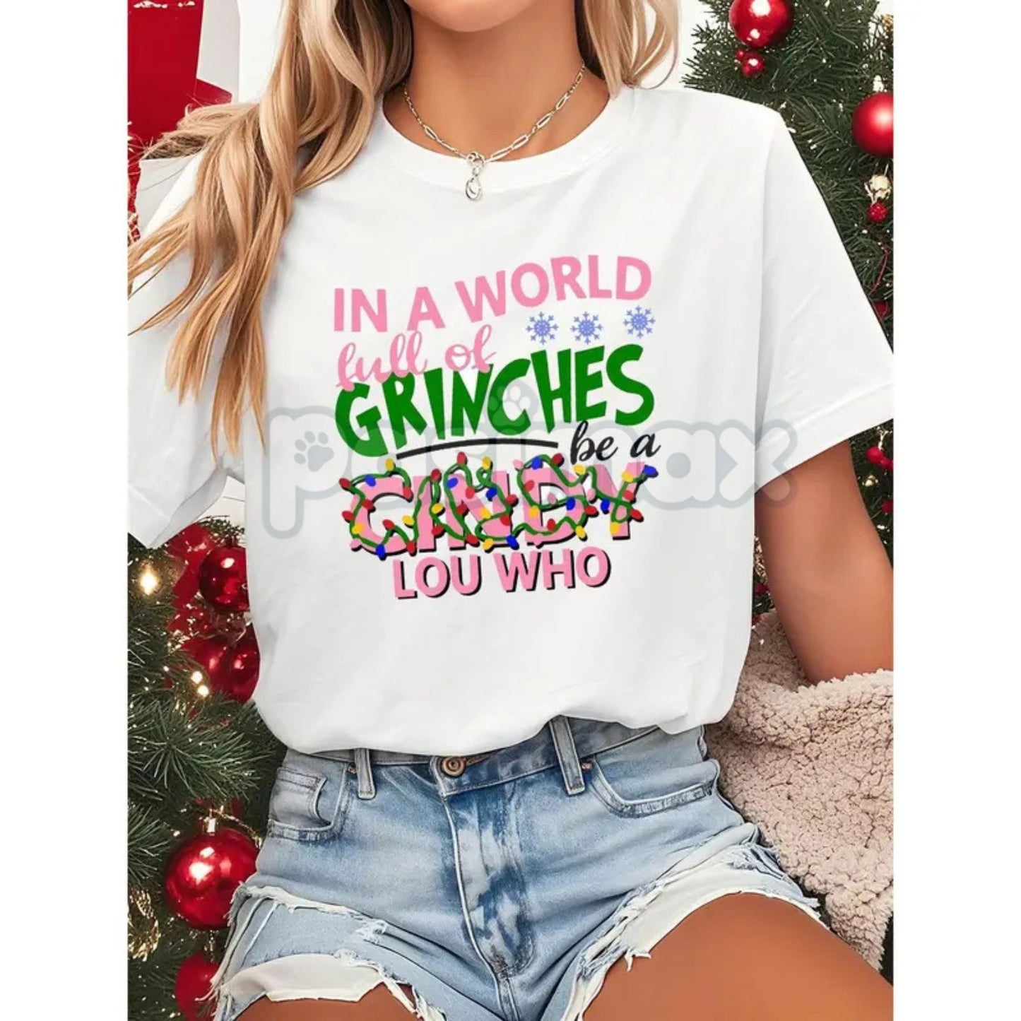 "In A World Full Of Grinches Be A Cindy Lou Who" T-Shirt - Inspirational Holiday Slogan Tee, Christmas Cheer Graphic Top, Unisex Short Sleeve Kindness Shirt