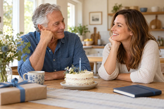 Fictional father and adult daughter sharing a birthday conversation at home; AI illustration.