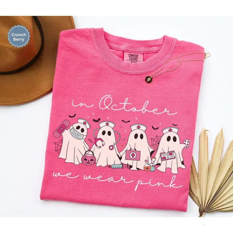 Comfort Colors® In October We Wear Pink Ghost Nurse T-Shirt – Oncology Nurse Halloween Graphic Tee, Pink Ribbon Breast Cancer Awareness Unisex Top & Gift
