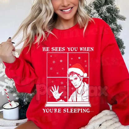 He Sees You When You're Sleeping Christmas Shirt | Funny Creepy Santa Surveillance Jumper | Dark Humor Holiday Crewneck | Naughty List Gift