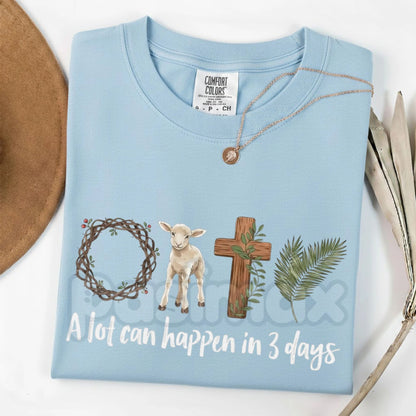 Comfort Colors® A Lot Can Happen In 3 Days T-Shirt – Christian Easter Graphic Tee, Resurrection Sunday Faith Shirt, Religious Palm Sunday Lamb & Cross Top