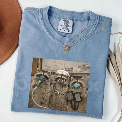 Comfort Colors® Nurse Raccoon T-Shirt – Funny ER Nurse Graphic Tee, Retro Trash Panda Healthcare Unisex Top