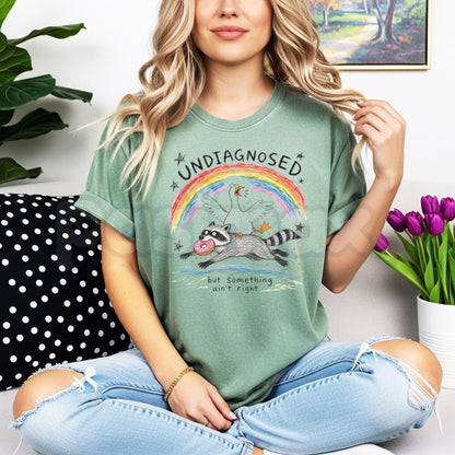 Comfort Colors® Undiagnosed But Something Ain't Right T-Shirt – Funny Sarcastic Graphic Tee, Relatable Mental Health Humorous Unisex Top & Gift