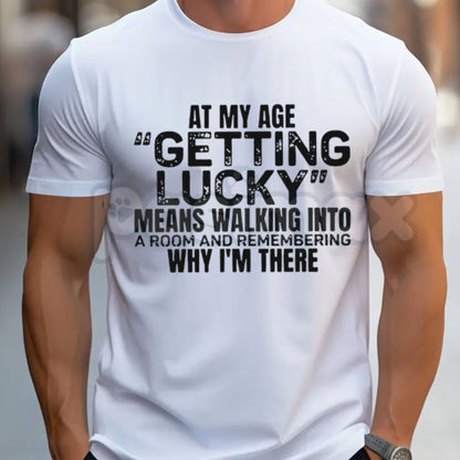 At My Age "Getting Lucky" Funny T-Shirt – Sarcastic Aging Graphic Tee, Premium 100% Cotton Humorous Dad Top, Soft Lived-In Heavyweight Over 50 Statement Shirt, Made in USA