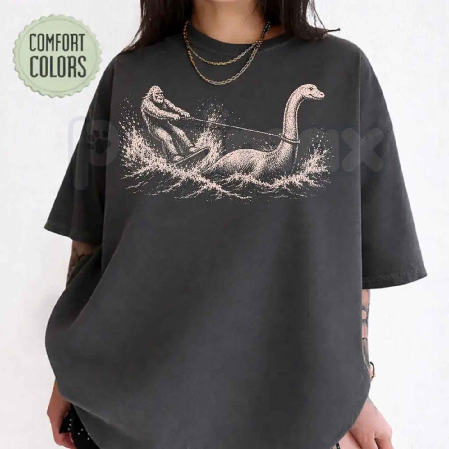Comfort Colors® Funny Bigfoot & Loch Ness Monster T-Shirt – Retro Cryptid Waterskiing Graphic Tee, Vintage Mythical Creature Lake Life Unisex Top
