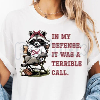 "Feral Baseball Mom" Funny Raccoon T-Shirt – Game Day Chaos Graphic Tee, Premium 100% Cotton Softball Mama Top, Soft Lived-In Heavyweight Team Mom Gift, Made in USA