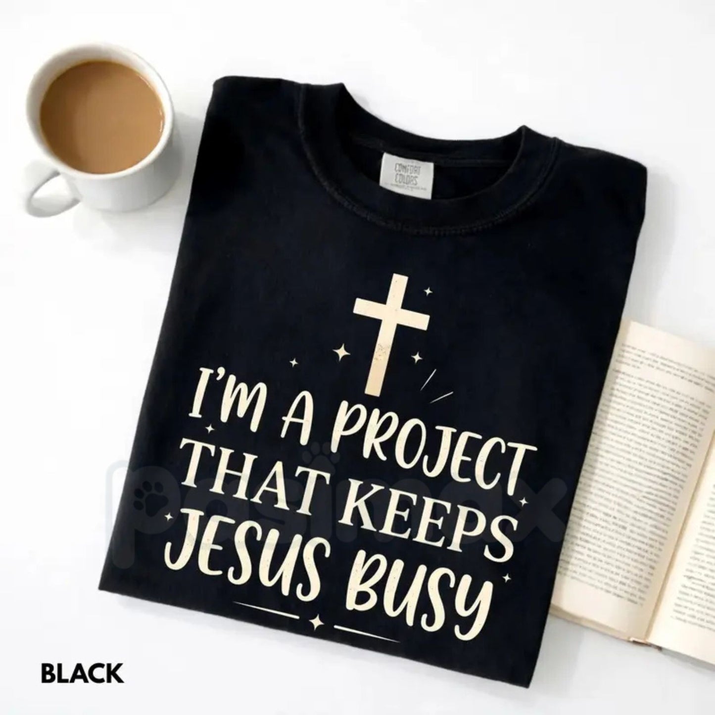 Comfort Colors® "I'm A Project That Keeps Jesus Busy" T-Shirt – Funny Christian Graphic Tee, Sarcastic Faith Humor Shirt, Aesthetic Religious Gift for Her