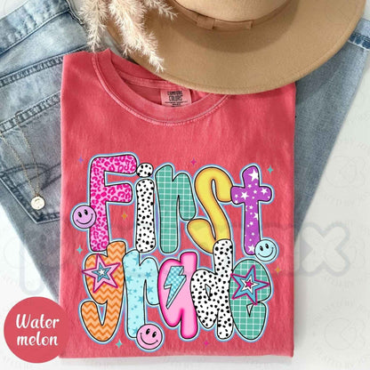 Comfort Colors® Retro "First Grade" Smiley Face T-Shirt – Back to School Aesthetic Graphic Tee, Vintage 90s Vibes Classroom Spirit Unisex Top