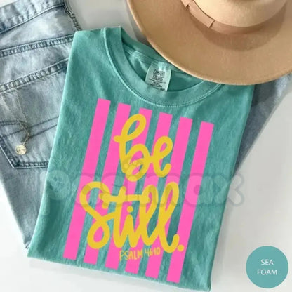 Comfort Colors® Be Still T-Shirt – Love Like Jesus Pink Stripes Graphic Tee, Girly Christian Aesthetic Shirt, Trendy Faith-Based Preppy Top