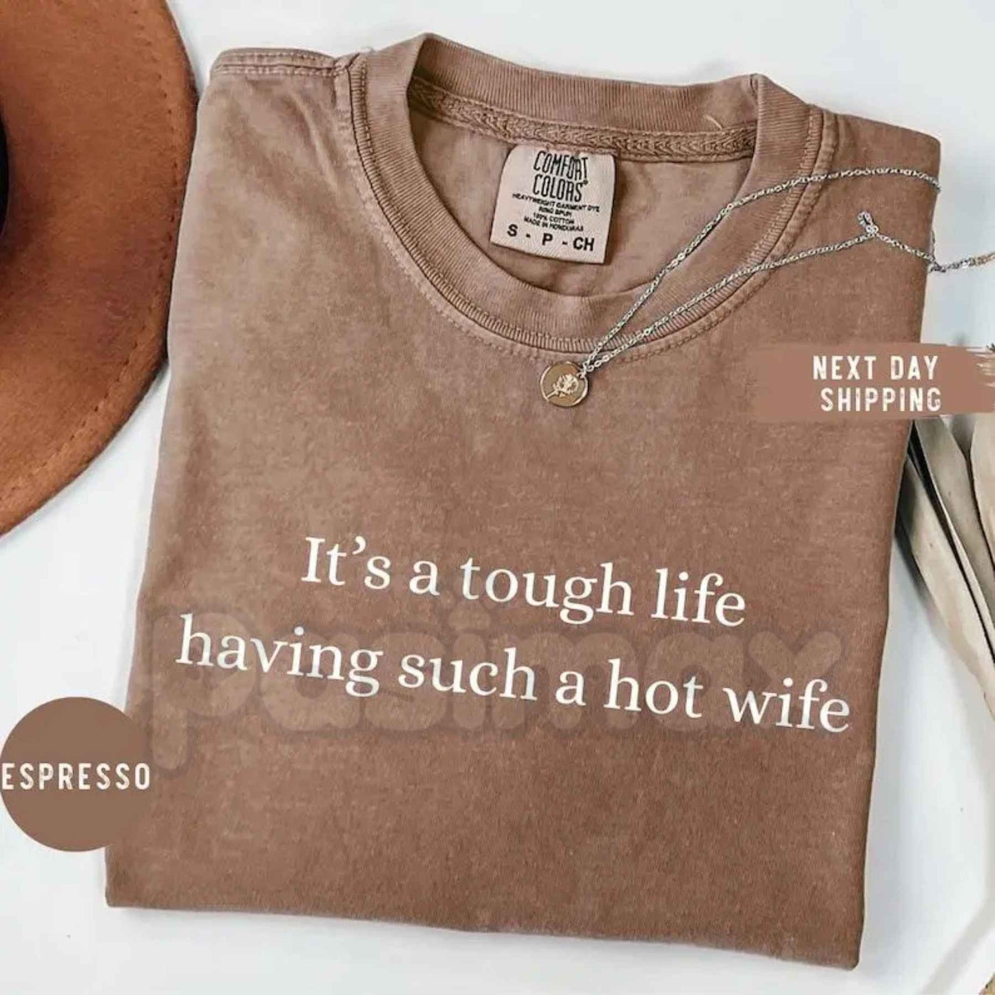 Comfort Colors® "It’s a Tough Life Having Such a Hot Wife" T-Shirt – Funny Sarcastic Husband Graphic Tee, Retro Aesthetic Quirky Anniversary Gift Top