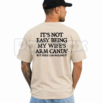 It's Not Easy Being My Wife's Arm Candy T-Shirt – Funny Husband Humor Unisex Cotton Graphic Tee
