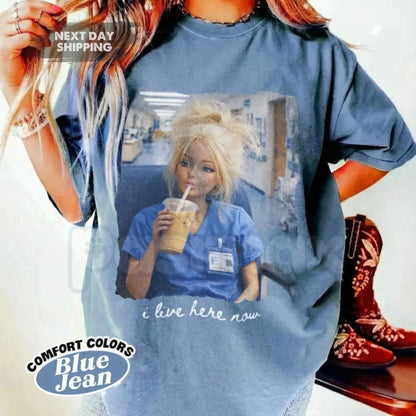Comfort Colors® Funny Nurse Doll T-Shirt – "I Live Here Now" Disgusting Doll Face Meme Tee, Sarcastic Healthcare Worker Gift, Nursing Humor Shirt