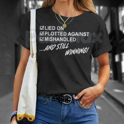 "Still Winning" Resilience T-Shirt - Lied On Plotted Against Mishandled Graphic Tee, Inspirational Survival Quote Shirt, Motivational Hustle Apparel, Premium Heavyweight Unisex Success Top, Overcomer Statement Shirt