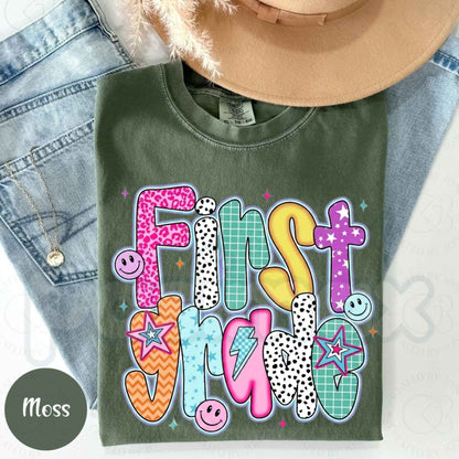 Comfort Colors® Retro "First Grade" Smiley Face T-Shirt – Back to School Aesthetic Graphic Tee, Vintage 90s Vibes Classroom Spirit Unisex Top
