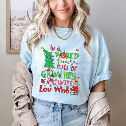 In a World Full of Grinches Be a Cindy Lou Who T-Shirt – Christmas Holiday Graphic Tee