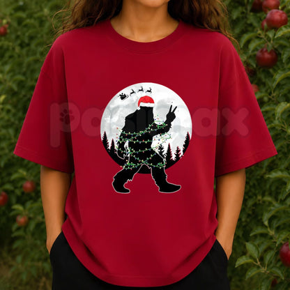 Funny Bigfoot Christmas Unisex Crew Neck T-Shirt – Santa Hat Bigfoot Christmas Lights Moon Graphic Tee