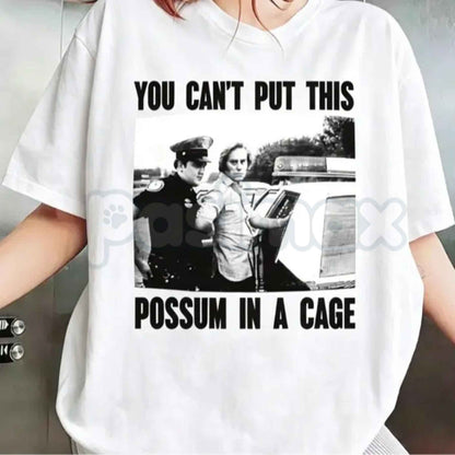 You Can’t Put This Possum In A Cage T-Shirt – Funny George Jones Arrest Outlaw Country Unisex Cotton Tee