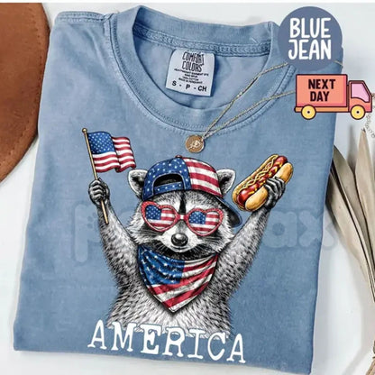 Comfort Colors® America Raccoon Hot Dog T-Shirt – Funny 4th of July Raccoon Tee, Retro Trash Panda Patriotic USA Holiday Gift Top