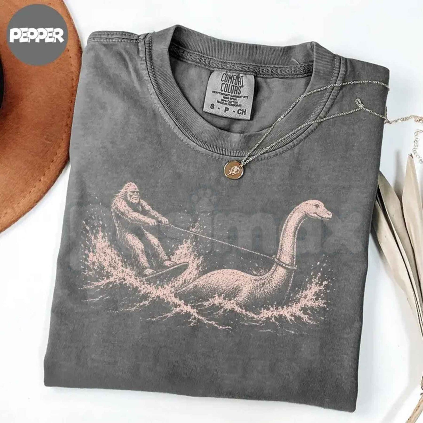 Comfort Colors® Funny Bigfoot & Loch Ness Monster T-Shirt – Retro Cryptid Waterskiing Graphic Tee, Vintage Mythical Creature Lake Life Unisex Top