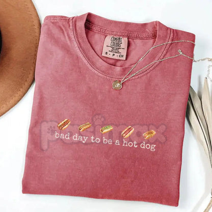Comfort Colors® Vintage "Bad Day To Be A Hot Dog" T-Shirt – Retro Summer BBQ Mascot Tee, Funny 4th of July Women's Graphic Top, Sarcastic Glizzy Season Shirt
