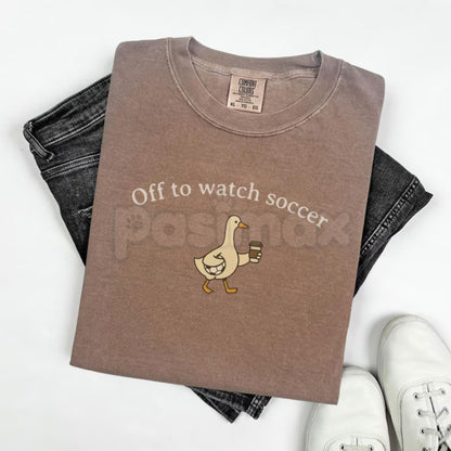 Comfort Colors® "Off To Watch Soccer" T-Shirt – Trendy Soccer Mom Graphic Tee, Retro Game Day Mama Shirt, Minimalist Sports Aesthetic Mother's Day Gift
