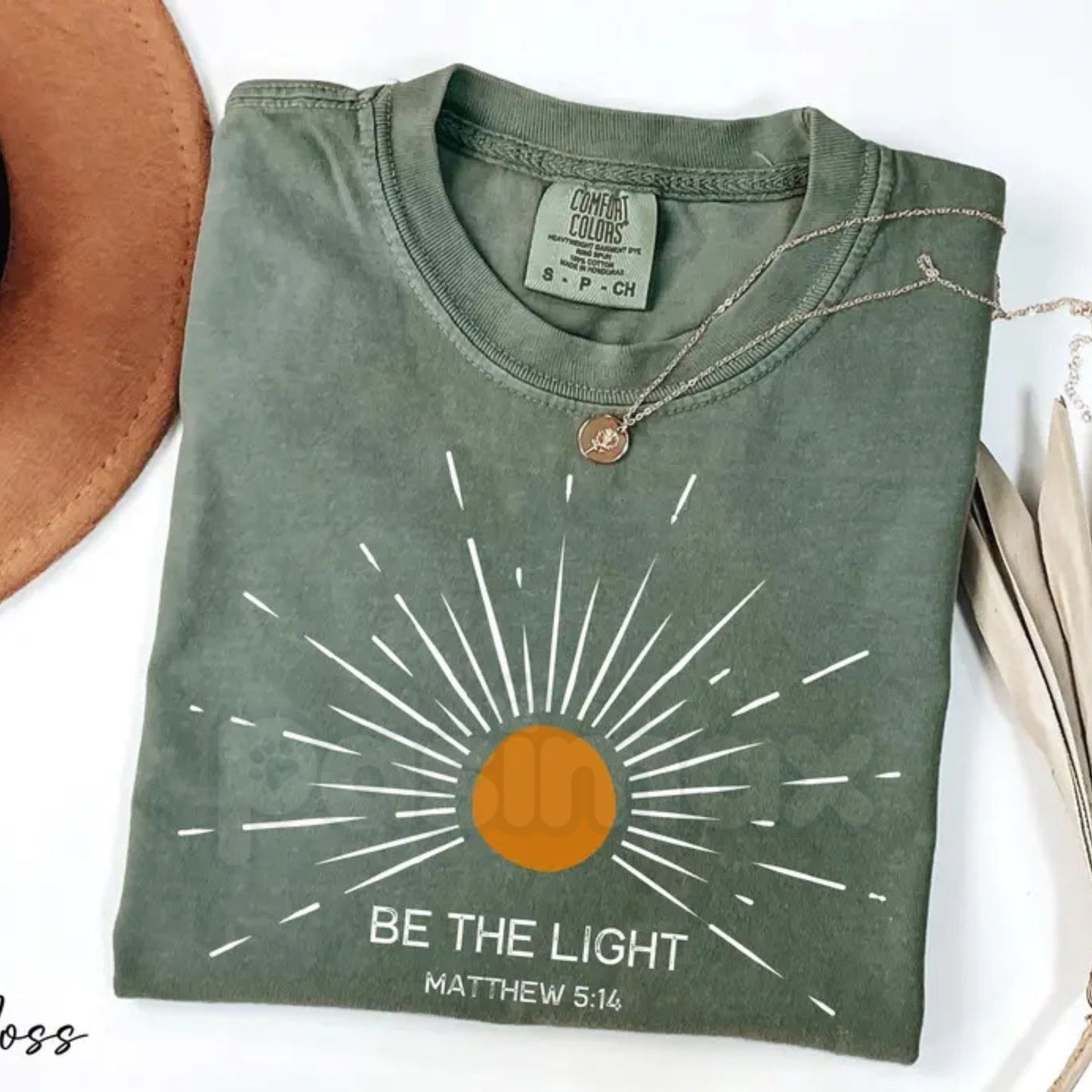 Comfort Colors® "Be The Light" Matthew 5:14 T-Shirt – Aesthetic Bible Verse Shirt, Retro Sunburst Religious Tee, Minimalist Faith-Based Sunlight Top