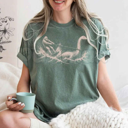 Comfort Colors® Funny Bigfoot & Loch Ness Monster T-Shirt – Retro Cryptid Waterskiing Graphic Tee, Vintage Mythical Creature Lake Life Unisex Top