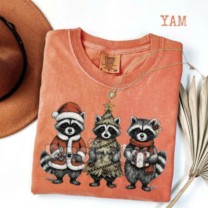 Comfort Colors® Festive Raccoon Family T-Shirt – Adorable Woodland Christmas Tee, Santa Hat Animal Gift