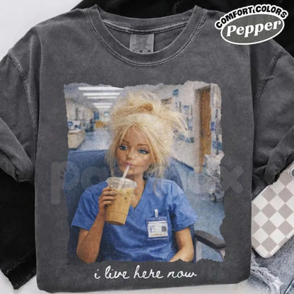 Comfort Colors® Funny Nurse Doll T-Shirt – "I Live Here Now" Disgusting Doll Face Meme Tee, Sarcastic Healthcare Worker Gift, Nursing Humor Shirt