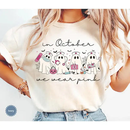 Comfort Colors® In October We Wear Pink Ghost Nurse T-Shirt – Oncology Nurse Halloween Graphic Tee, Pink Ribbon Breast Cancer Awareness Unisex Top & Gift
