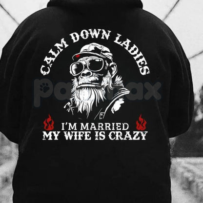 Calm Down Ladies I’m Married & My Wife Is Crazy Hoodie – Funny Husband Gift, Sarcastic Marriage Protection Pullover, Edgy Men’s Streetwear-Pasimax