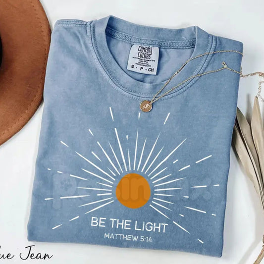 Comfort Colors® "Be The Light" Matthew 5:14 T-Shirt – Aesthetic Bible Verse Shirt, Retro Sunburst Religious Tee, Minimalist Faith-Based Sunlight Top-Pasimax