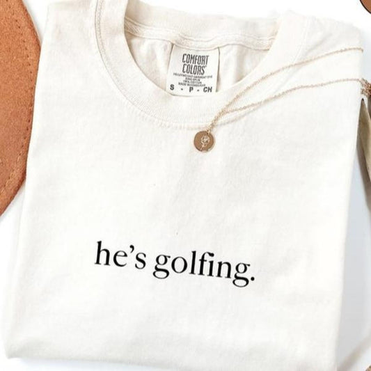 Comfort Colors "He's Golfing" Shirt – Golfer Wife Tee, Funny Golf Player Shirt, Unisex Casual Relaxed Fit, Golf Lover Gift-Pasimax