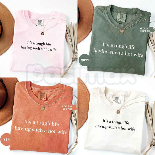 Comfort Colors® "It’s a Tough Life Having Such a Hot Wife" T-Shirt – Funny Sarcastic Husband Graphic Tee, Retro Aesthetic Quirky Anniversary Gift Top-Pasimax