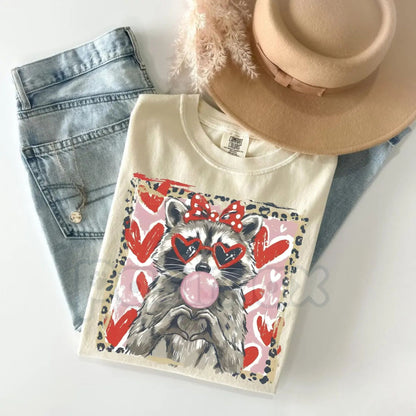 Comfort Colors® Leopard Valentine Raccoon T-Shirt – Cute Trash Panda Love Tee, Trendy Leopard Heart Animal Shirt, Aesthetic Valentine's Day Gift-Pasimax