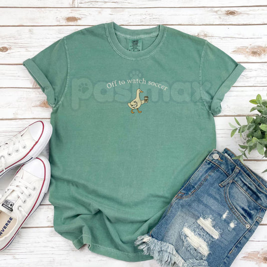 Comfort Colors® "Off To Watch Soccer" T-Shirt – Trendy Soccer Mom Graphic Tee, Retro Game Day Mama Shirt, Minimalist Sports Aesthetic Mother's Day Gift-Pasimax