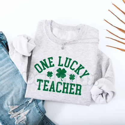 One Lucky Teacher Adult Sweatshirt | Green Varsity Lettering St Patrick's Day Crewneck | Shamrock Accent Teacher Pullover | Lucky Educator Holiday Outfit | Retro Varsity St Pattys Shirt | Soft Cozy Teacher Gift Jumper-Pasimax