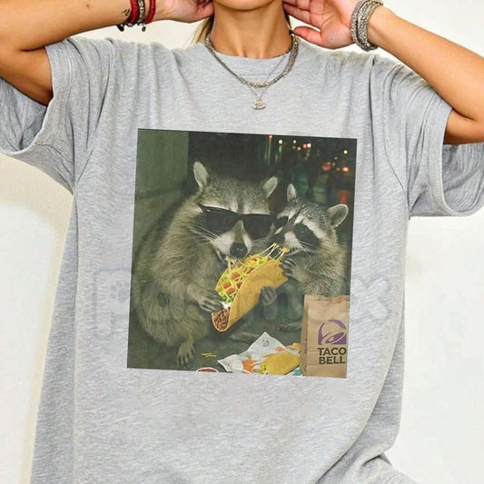 Raccoon Eating Taco Funny T-Shirt - Trash Panda Meme Graphic Tee, Premium 100% Cotton Animal Snack Shirt, Hilarious Raccoon Lover Top, Unique Foodie Humor Apparel, Soft Lived-In Unisex Streetwear-Pasimax