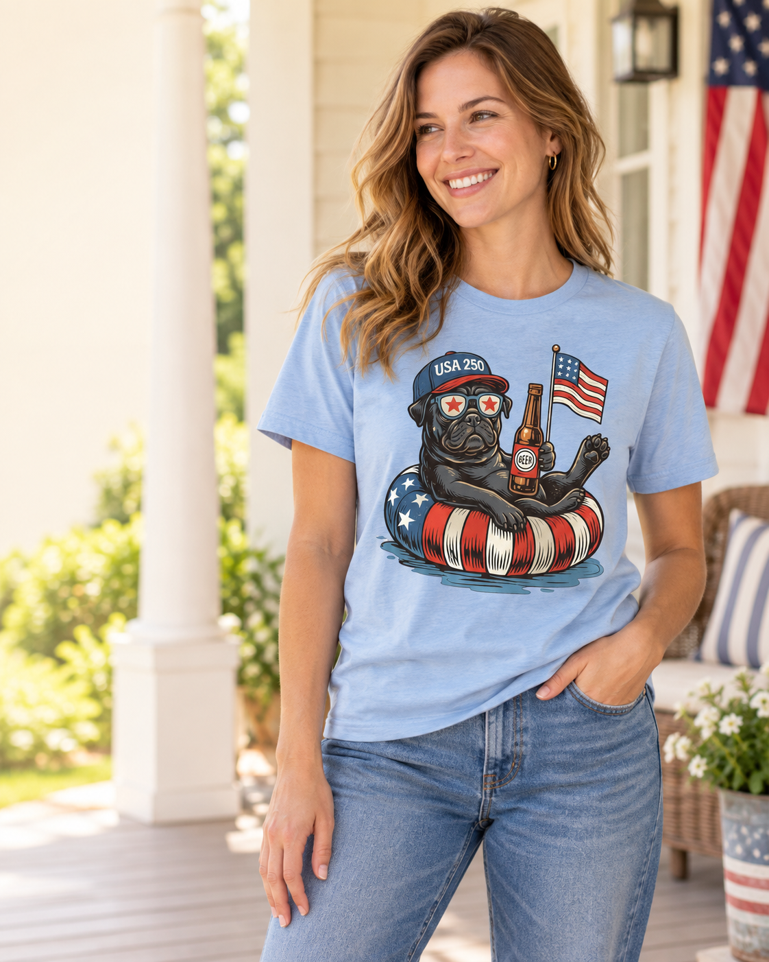 Woman wearing a light blue USA 250 pug graphic tee